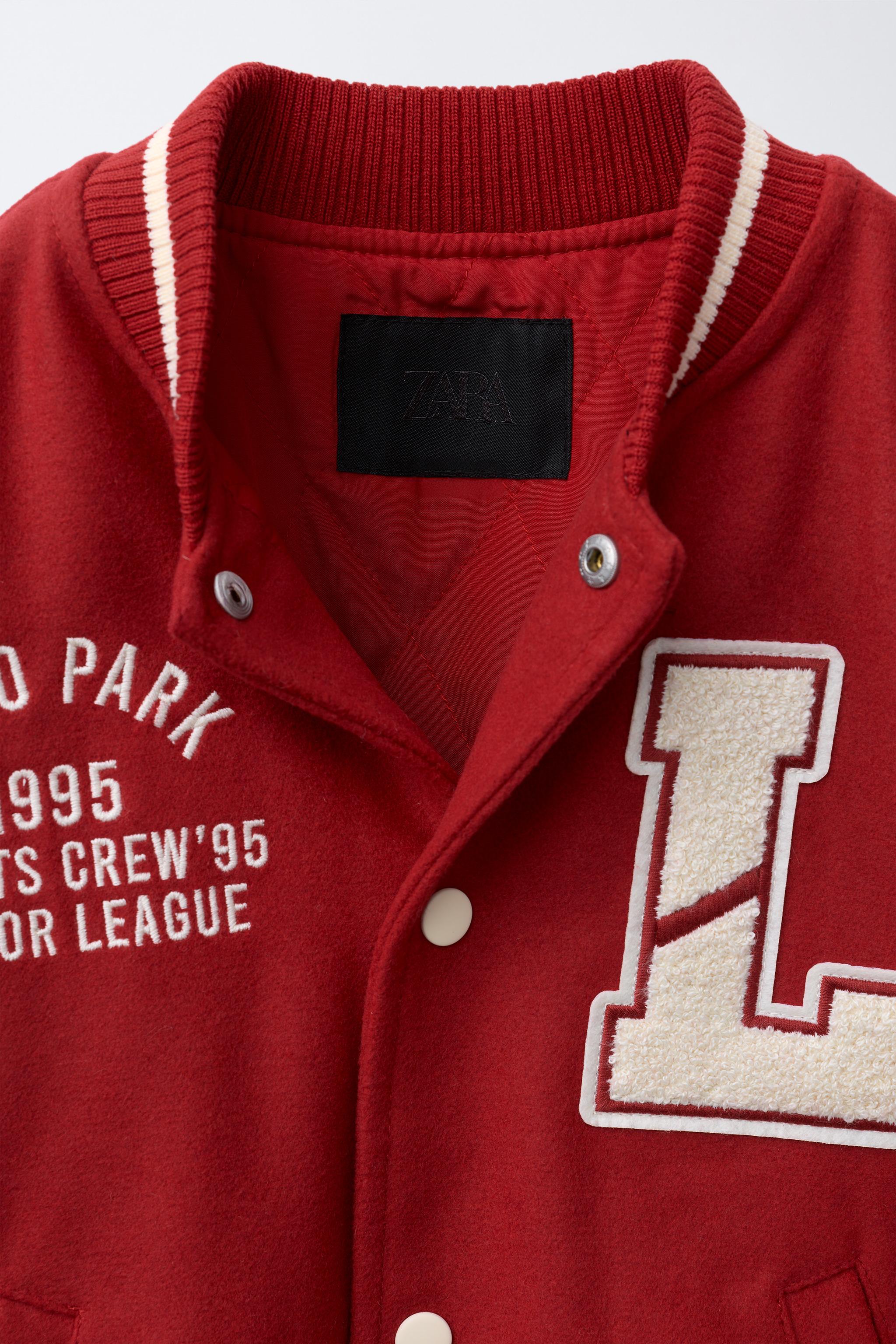 CLOTH BOMBER JACKET WITH FAUX LEATHER SLEEVES AND PATCHES